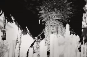 grayscale photo of religious statue